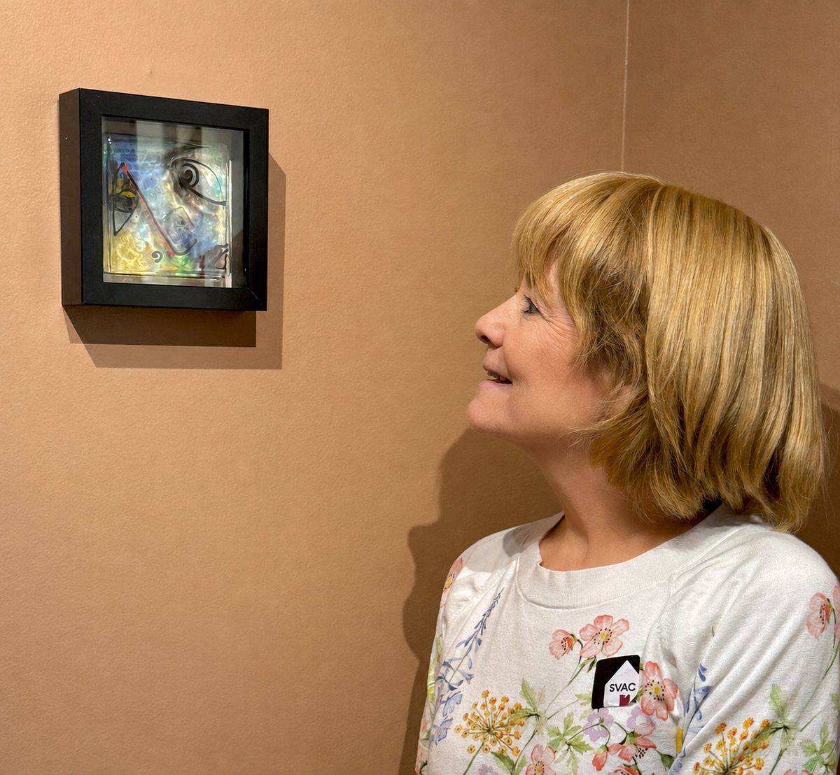 Lisa Caron Hickey with her fused-glass artwork at the Southern Vermont Arts Center. Photo: Lisa Caron Hickey / Caron Designs