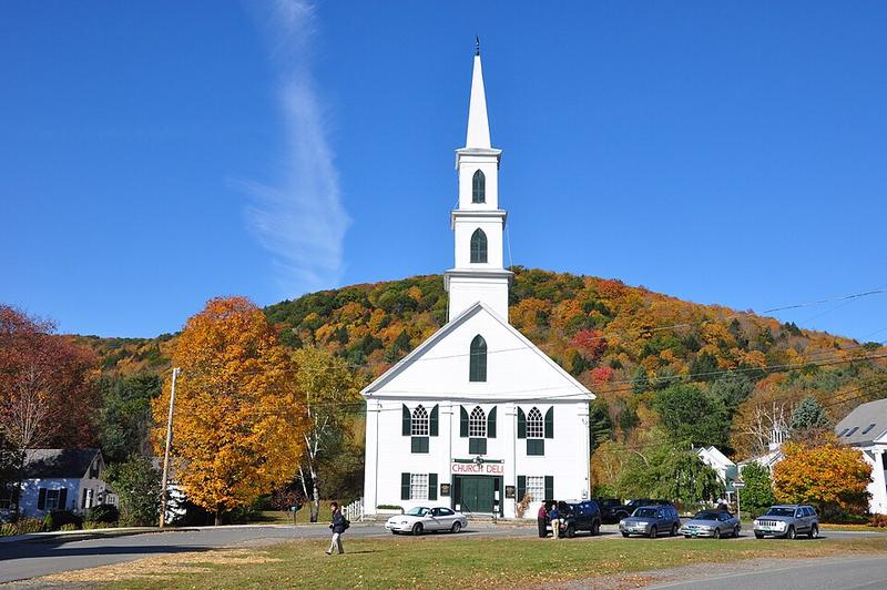 White church in Newfane, Vermont surrounded by fall color